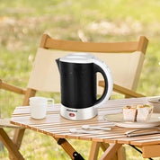 Aigostar Cooltravel - Mini Wasserkocher Klein 0,6 Liter Reisewasserkocher 650W, Camping Kleiner Wasserkocher Inklusive 2 Tassen und 2 Teelöffel, Abschaltautomatik mit Trockenschutz, Shwarz.